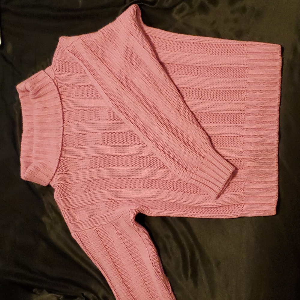 Pink turtleneck sweater